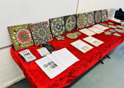 High Trees Mosaic Mandala learners win the Outstanding Learner Group Award at the Lambeth Adult Learning End of Year Conference